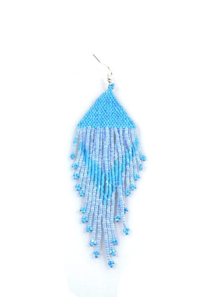 Heaven Eleven oorbel tibetaanse kralen licht blauw