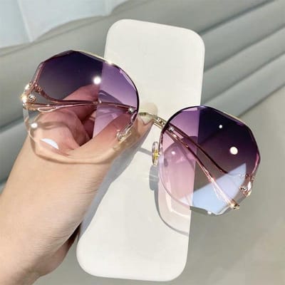 Randloze Zonnebril Bril Dames Oceaan Water Cut Oogbescherming Dames Heren Geslepen Lens Duurzaam Metaal Metal Gebogen Tempels Zon Zonnebril Vrouwelijk UV400 only 1pcs sunglasses