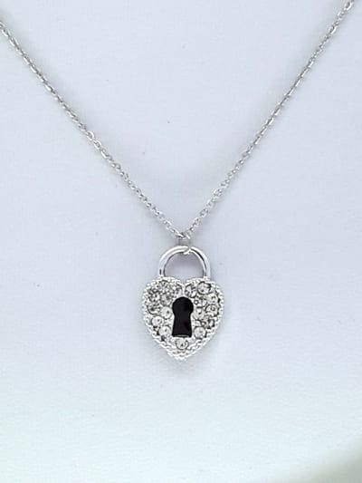 HartjeKetting - RVS - schakelketting met hanger in de vorm van een hartvormig hangslot. Sieraad staat bekend om zijn minimalistische en elegante uitstraling.