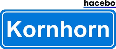 Hacebo - Plaatsnaam Sticker - 29x10 CM - Kornhorn sticker - Verkeersborden sticker - grappige cadeaus - Kornhorn