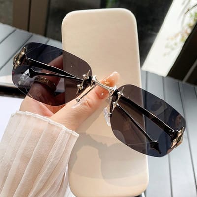 Lunettes de soleil stylées sans monture pour femmes Style vintage Tendance Sans monture Métal Lunettes de soleil Protection solaire Anti lumière bleue Lunettes de soleil pour fête et voyage