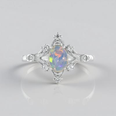 Cavill - 925 Sterling Zilver Ring - Platina Verguld - Welo Opaal 0,39 ct met Zirkonia 0,15 ct - Ovaal Edelsteen - Kleurrijk Speel