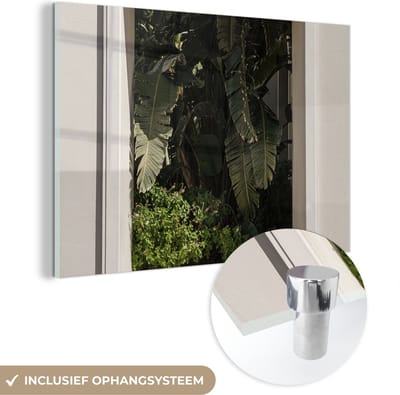 MuchoWow® Glasschilderij 150x100 cm - Schilderij acrylglas - Raam - Planten - Tropisch - Zomer - Foto op glas - Schilderijen