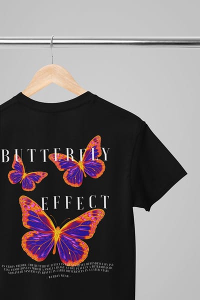 Oversized shirt - Butterfly effect - Wurban Wear | 2XL/5XL | T-shirt | Merk kleding | Unisex tshirt | Streetwear | Pump cover | Techno outfit | Merk shirt | Gym shirt | Urban | Grote maten tshirts heren | Grote maten shirts dames | Zwart