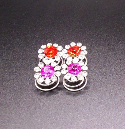 Curlies met diamanten rood-roze