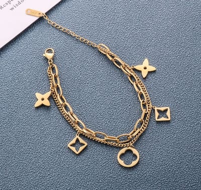 Bedelarmband goudkleurig met dubbele schakelketting . Armband met bedels in gouden kleur van Sophie Siero incl. geschenkverpakking.