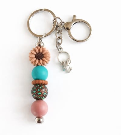 Sleutelhanger, tashanger met kralen | bloem | bruin, teal | sleutelbosje