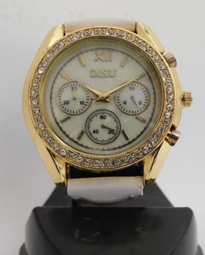 Goudkleurige horloge met steentjes en witte band