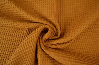 Wafelstof - 1 meter - Per meter - Donker okergeel - 150cm breed