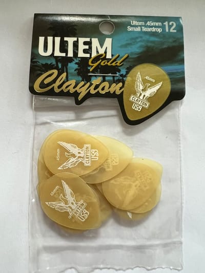 Clayton - Ultem Gold - small teardrop plectrum - 0.45 mm - 12-pack