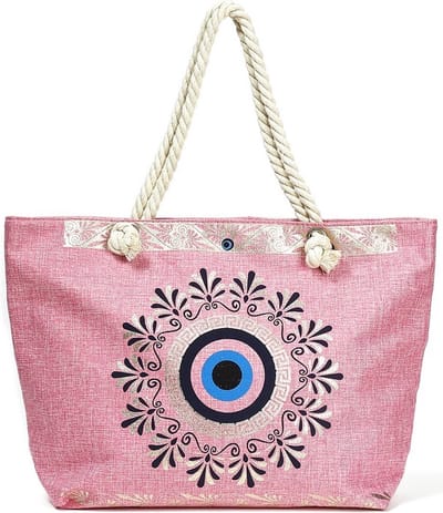 Een vrolijke strandtas met een fleurige roze print (55x35cm) gevoerd en afsluitbaar met een rits aan de binnenkant. Een handige tas om veel in mee te kunnen nemen. Afgewerkt met twee handvaten van gedraaid touw. Voor uzelf of als Cadeau.