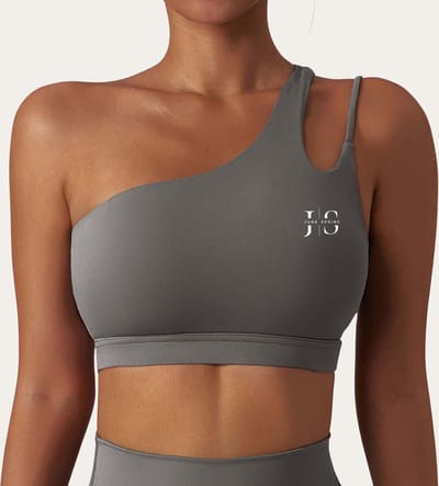 Sport Top / BH - June Spring - Maat: L - Kleur: Clay (Grijs / Grey) - Sportbeha - Sporttop met Ondersteuning - Hoge Kwaliteit - Bijpassend Legging & Vest ook Verkrijgbaar - Fitness Outfit - One Shoulder / Offshoulder - Fitness BH - Sport Topje Dames