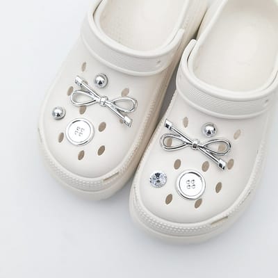 Schoenaccessoires-geschikt voor crocs charms- geschikt voor crocs pins- geschikt voor crocs Accessoires- geschikt voor Crocs Jibbitz-8 glanzende zilveren strikknopen