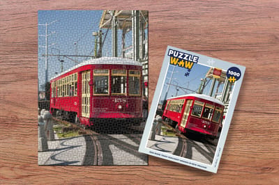 Puzzel Een rode tram vervoert mensen in New Orleans - Legpuzzel - Puzzel 1000 stukjes volwassenen
