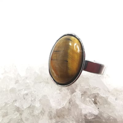 Ring - RVS - Gouden Tijgeroog - Edelsteen - maat 16 - Ovaal - Zilverkleurig. Gouden Tijgeroog versterkt (zelf)vertrouwen en trekt geluk en succes aan.