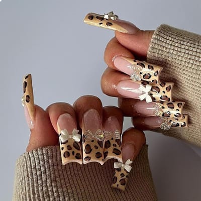 Dailygoods- Valse Nagels 24 Stuks - Franse Tip Plaknagels - Lange Ovale Kunstnagels - Bruin Cheetah Glans - Inclusief Nagelvijl - 3D Design