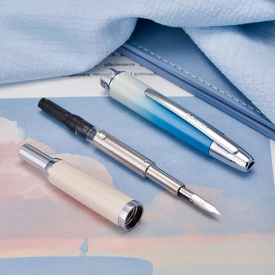 Push fountain pen met retractable fijne nib, inktconverter en metalen penbox, gradient blauw, perfect voor schrijven en tekenen