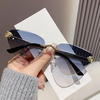 Cat Eye Randloze Zonnebril heren Dames Sexy Luxe Cateyes Metalen Zonnebril Dames Verlooplens Brillen Schermen UV400 voor dagelijks gebruik