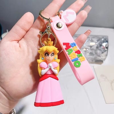 Pradeo - Alternatieve Sleutelhanger Van Princess Peach - Super Mario - Hard Siliconen - Cadeau Voor Volwassenen en Kinderen - Geschenk Voor Verjaardagen en Feestdagen - Cadeautje Voor Hem & Haar - Key Chain