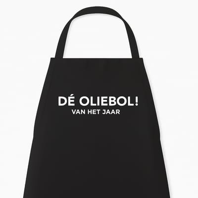 Kerst keukenschort - keukenschort oud & nieuw “De Oliebol van het Jaar” - Grappige kookschort - One Size - Verstelbaar - Zwart - Origineel feestdagen cadeau