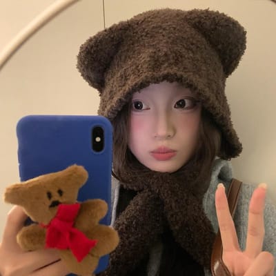 Chapeau d'hiver en peluche mignon en laine pour femme Simple et polyvalent Extérieur Tricoté Résistant au froid et chaud Protection des oreilles Mode Chapeau Ours one size