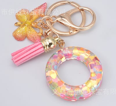 Sleutelhangers of voor je tas van A tot Z - met een pompon of kwastje - met letter - mooi design - handgemaakt - sleutelhangers - design - mode - goud - zwart - blauw - roze- rood