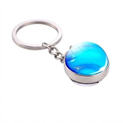 Zilverkleurige ronde sleutelhanger met planeet Neptunus afbeelding – sleutelhanger voor dames en heren – metalen keychain met blauwe planeet hanger en schakel ketting
