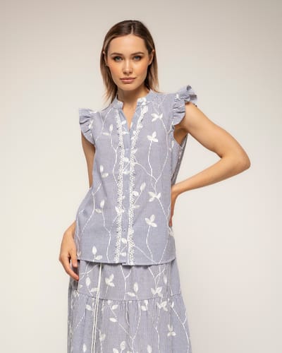 Gestreepte blouse met borduursels en kantdetail met ruches aan de mouwen