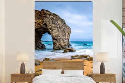 Behang - Fotobehang Stenen - Water - Strand - Rots - Golven - Breedte 160 cm x hoogte 240 cm