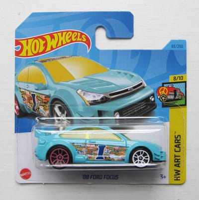 HOT WHEELS FORD FOCUS '08 83/250 1:64 TURQOISE HW ART CARS 08/10 SHORT CARD
