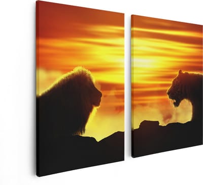 Artaza Canvas Schilderij Tweeluik Leeuw En Tijger - Silhouet - Zonsopkomst - 80x60 cm - Wanddecoratie Woonkamer - Schilderijen - Muurdecoratie