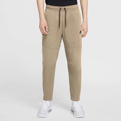 Nike NSW Woven Pants - Trainingsbroek - Maat XS - Beige - Sportswear - Training - Heren Trainingsbroek voor Mannen
