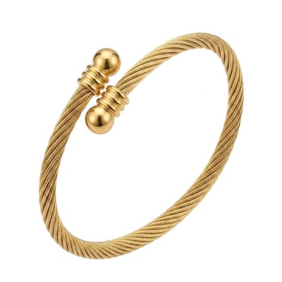 Goudkleurige bangle armband voor dames – metalen armband met draaddesign en bolletjes