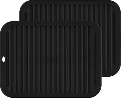 Daity 2-pack siliconen verwarmingsmatten voor in de keuken - geschikt voor het plaatsen van hete potten en pannen en tevens te gebruiken als statief. Antislip en warmte-isolerend - geschikt voor kwartswerkbladen en keukenkastjes (zwart).