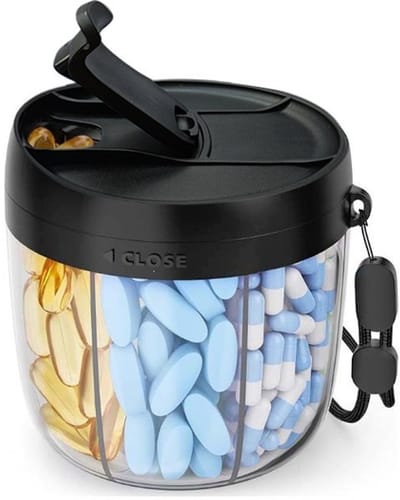 Pillendoosje - Leuk pillendoosje - Reispillendoosje - Pillendoosje dat door elkaar gehaald wordt - Pillendoosje - Ontwerp met 7 vakjes - Brede opening - 8,9*8,9*9,68 cm - Geschikt voor uitstapjes, reizen, zakenreizen, enz. - Zwart,transparant