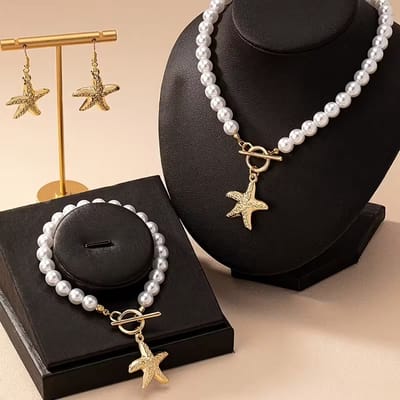 My Sweet Romance® – 3-delige Sieradenset met Parelketting, Armband & Zeesteroorbellen – Goudkleurig – Zomer & Strand