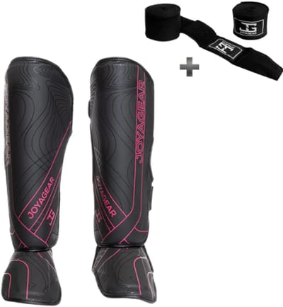 Joya ESSENTIAL Scheenbeschermers – Kickboksen/Muay Thai/MMA – Zwart/Roze – Maat S – Ergonomische pasvorm, schokabsorberende padding – Inclusief Bandage