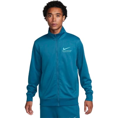 Nike-branding Op De Achterkant Van Een Blauw Trainingsjack Met Rits