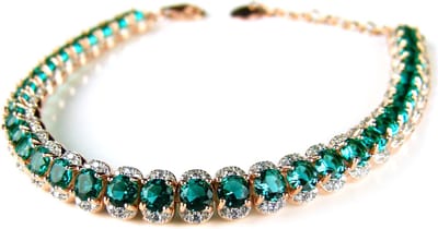 Armband tennis in zilver roos goud verguld gezet met groene stenen en cubic zirconia