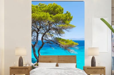 Behang - Fotobehang Boom - Zee - Tropisch - Zomer - Breedte 145 cm x hoogte 220 cm