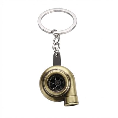 Oud goudkleurige sleutelhanger turbocharger vorm met metalen sleutelring, sleutelhanger voor heren en dames, compact accessoire met mechanisch uiterlijk en decoratief detail