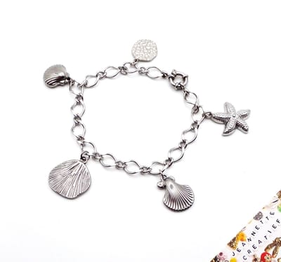 Jeannette-Creatief® - Beach - Bedelarmband Zeestar Starfish Schelpen Shell RVS Zilver Jasseron Boeislot Ammoniet - Bedel Zeester - Bedel Schelp - Bedels - Strandsieraden - Zomerse Sieraden - Schelpen- Schelpenarmband – Mermaidcore