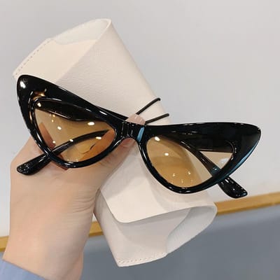 Lunettes de soleil œil de chat vintage élégantes pour dames Lunettes de soleil de designer de luxe pour femmes Lunettes de soleil punk tendance Lunettes de soleil sexy pour femmes UV400