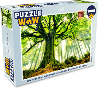 Puzzel Een oude beuk met groen gekleurde takken in de boom - Legpuzzel - Puzzel 1000 stukjes volwassenen