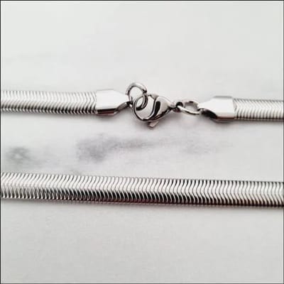 Aramat Jewels | Halskettingen | Stalen Platte Omega Ketting - Zilverkleurig Ketting | | | |6mm | Staal | Volwassenen | Verkleurd niet