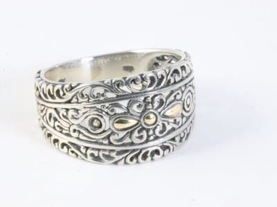 Traditionele opengewerkte zilveren ring met 18k gouden decoraties - maat 17.5
