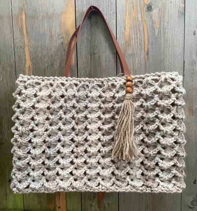 HAAKPAKKET TAS 'V-TAIGA' JUTE.