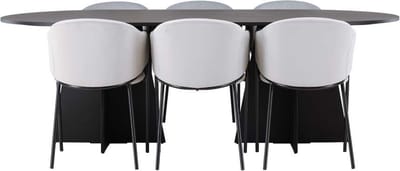 Bootcut eethoek tafel zwart en 6 Evelina stoelen grijs.