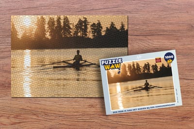 Puzzel Een man is aan het roeien bij een zonsondergang - Legpuzzel - Puzzel 1000 stukjes volwassenen