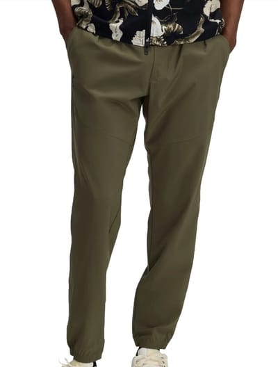 Under armour vibe woven trainingsbroek in de kleur groen.
